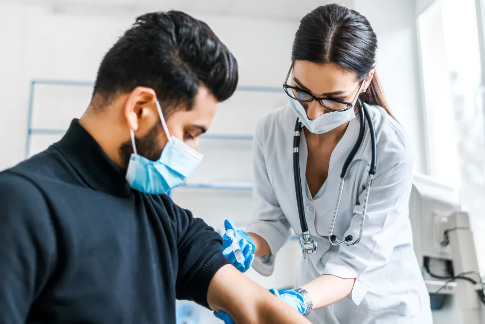 A health worker giving a vaccination