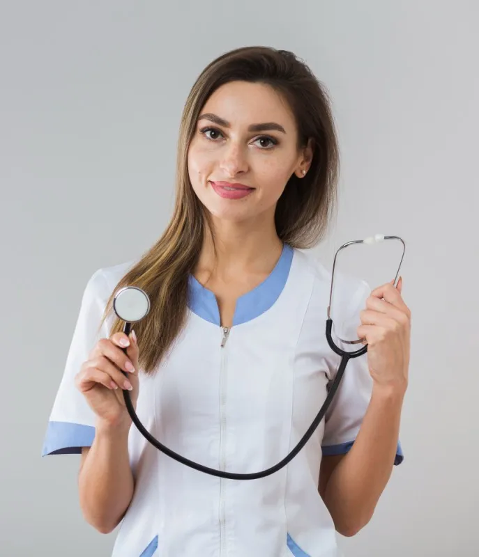 A smiling doctor holding a stethoscope